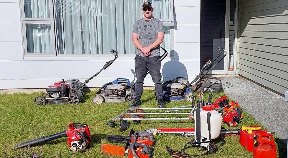 The owner-operator of All Lifestyles Property Maintenance with his full lineup of mowing and property maintenance equipment